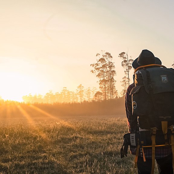 man-in-black-backpack-during-golden-hour-1230302.jpg 