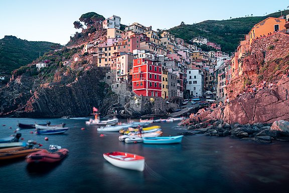 white-and-red-boat-on-water-near-brown-concrete-buildings-3711348.jpg 